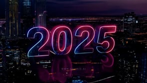 "Aerial view of a neon ""2025"" celebrating the New Year across a stunning city skyline at night."