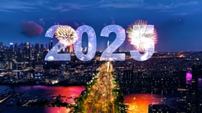 New Year's Eve 2025 captured from above with a stunning aerial city view and vibrant fireworks.