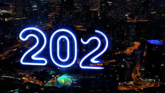 Neon city skyline sparkling with the year 2025 in lights, setting a bright tone for New Year�s Eve.