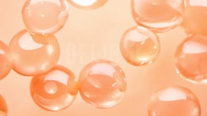 Bubble therapy skincare with a gentle peach tone, promoting soft and smooth skin health.