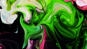 Abstract ink splash with vivid green and pink color combinations for a lively background.