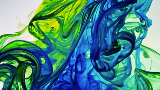 A bold and intense abstract background featuring blue and green color bursts with artistic flair.