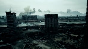 Aerial view of a destroyed city after a disaster, depicting the aftermath of a catastrophic event such as an earthquake, flood, or fire.