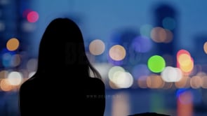 Modern Cityscape Woman Looking Out Through Big Window Lights Bokeh Blurred Background