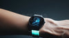 A smartwatch with futuristic digital particles integrated into the image, showcasing the next level of wearable tech.